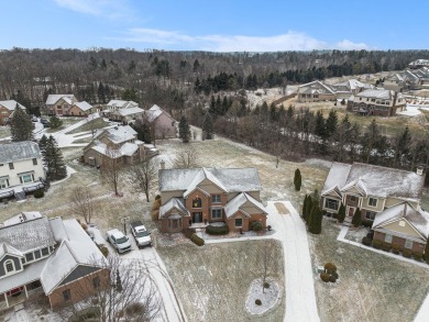 Peace and privacy are yours at this impressive brick home on a on Stonebridge Golf Club in Michigan - for sale on GolfHomes.com, golf home, golf lot