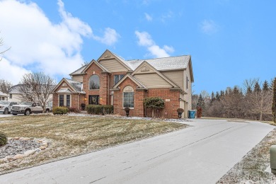 Peace and privacy are yours at this impressive brick home on a on Stonebridge Golf Club in Michigan - for sale on GolfHomes.com, golf home, golf lot