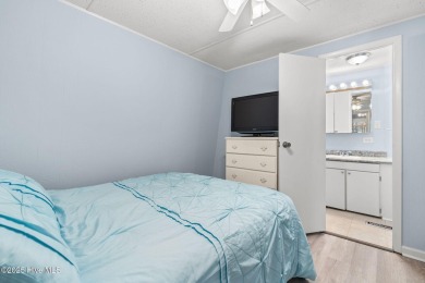 This charming residence is ideally located near the beach on Oyster Bay Golf Links in North Carolina - for sale on GolfHomes.com, golf home, golf lot