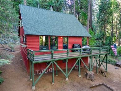 Don't be deceived by its charming rustic facade, this 2 bedroom on Sequoia Woods Country Club in California - for sale on GolfHomes.com, golf home, golf lot