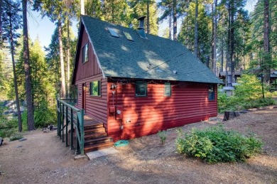 Don't be deceived by its charming rustic facade, this 2 bedroom on Sequoia Woods Country Club in California - for sale on GolfHomes.com, golf home, golf lot