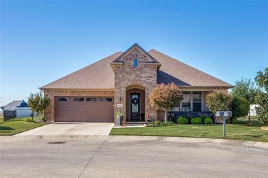 Discover comfort, style, and privacy in this beautifully on Wildhorse Golf Club of Robson Ranch in Texas - for sale on GolfHomes.com, golf home, golf lot