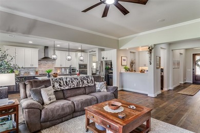 Discover comfort, style, and privacy in this beautifully on Wildhorse Golf Club of Robson Ranch in Texas - for sale on GolfHomes.com, golf home, golf lot