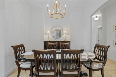 Discover coastal luxury in this former model home, meticulously on Peninsula Golf and Racquet Club in Alabama - for sale on GolfHomes.com, golf home, golf lot
