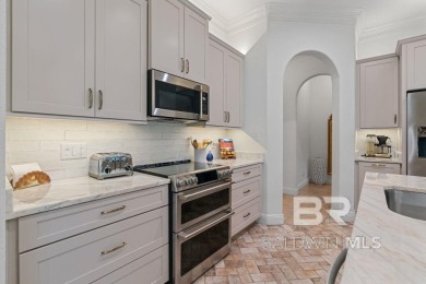 Discover coastal luxury in this former model home, meticulously on Peninsula Golf and Racquet Club in Alabama - for sale on GolfHomes.com, golf home, golf lot
