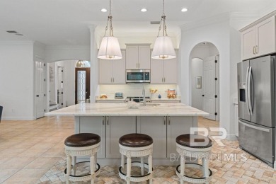 Discover coastal luxury in this former model home, meticulously on Peninsula Golf and Racquet Club in Alabama - for sale on GolfHomes.com, golf home, golf lot