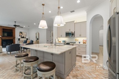 Discover coastal luxury in this former model home, meticulously on Peninsula Golf and Racquet Club in Alabama - for sale on GolfHomes.com, golf home, golf lot