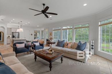 Discover coastal luxury in this former model home, meticulously on Peninsula Golf and Racquet Club in Alabama - for sale on GolfHomes.com, golf home, golf lot