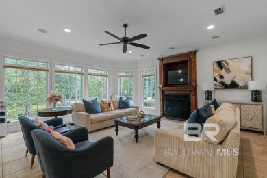 Discover coastal luxury in this former model home, meticulously on Peninsula Golf and Racquet Club in Alabama - for sale on GolfHomes.com, golf home, golf lot