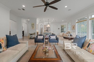 Discover coastal luxury in this former model home, meticulously on Peninsula Golf and Racquet Club in Alabama - for sale on GolfHomes.com, golf home, golf lot