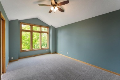 Nestled in the heart of Woodbury's serene Eagle Valley Golf on Eagle Valley Golf Course in Minnesota - for sale on GolfHomes.com, golf home, golf lot