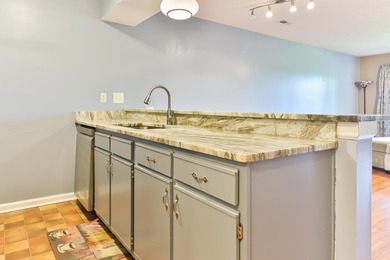 Welcome to 4990 Windsor Green Way, Unit 102, a first-floor condo on Mystical Golf Man O War Golf Links in South Carolina - for sale on GolfHomes.com, golf home, golf lot