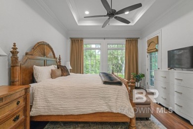 Discover coastal luxury in this former model home, meticulously on Peninsula Golf and Racquet Club in Alabama - for sale on GolfHomes.com, golf home, golf lot