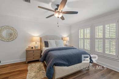 Discover coastal luxury in this former model home, meticulously on Peninsula Golf and Racquet Club in Alabama - for sale on GolfHomes.com, golf home, golf lot
