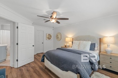 Discover coastal luxury in this former model home, meticulously on Peninsula Golf and Racquet Club in Alabama - for sale on GolfHomes.com, golf home, golf lot