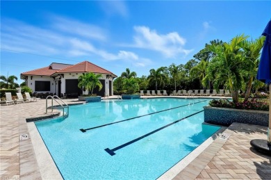 Nestled in the heart of beautiful Naples Heritage Golf and on Naples Heritage Golf and Country Club in Florida - for sale on GolfHomes.com, golf home, golf lot
