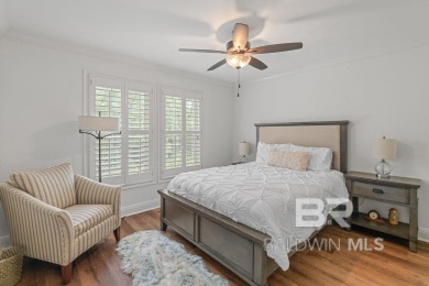 Discover coastal luxury in this former model home, meticulously on Peninsula Golf and Racquet Club in Alabama - for sale on GolfHomes.com, golf home, golf lot