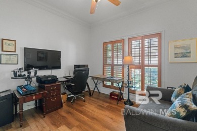 Discover coastal luxury in this former model home, meticulously on Peninsula Golf and Racquet Club in Alabama - for sale on GolfHomes.com, golf home, golf lot
