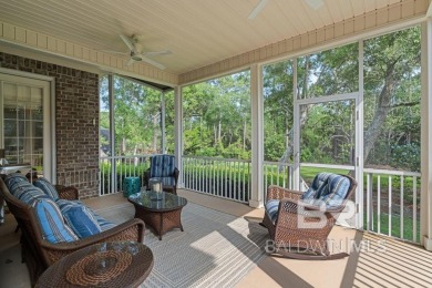 Discover coastal luxury in this former model home, meticulously on Peninsula Golf and Racquet Club in Alabama - for sale on GolfHomes.com, golf home, golf lot