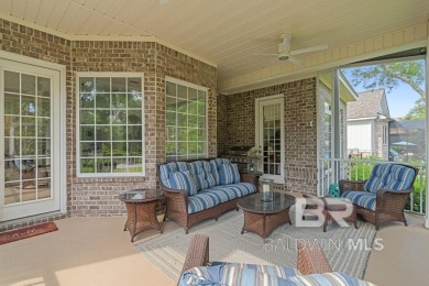 Discover coastal luxury in this former model home, meticulously on Peninsula Golf and Racquet Club in Alabama - for sale on GolfHomes.com, golf home, golf lot