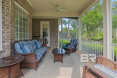 Discover coastal luxury in this former model home, meticulously on Peninsula Golf and Racquet Club in Alabama - for sale on GolfHomes.com, golf home, golf lot