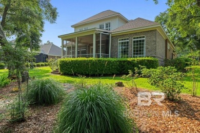 Discover coastal luxury in this former model home, meticulously on Peninsula Golf and Racquet Club in Alabama - for sale on GolfHomes.com, golf home, golf lot