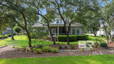 Discover coastal luxury in this former model home, meticulously on Peninsula Golf and Racquet Club in Alabama - for sale on GolfHomes.com, golf home, golf lot
