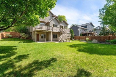 Nestled in the heart of Woodbury's serene Eagle Valley Golf on Eagle Valley Golf Course in Minnesota - for sale on GolfHomes.com, golf home, golf lot
