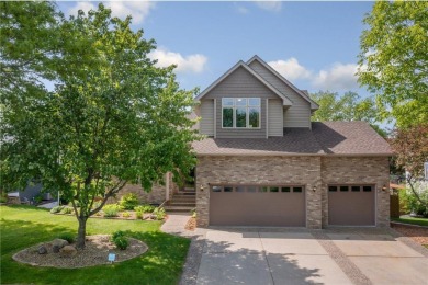 Nestled in the heart of Woodbury's serene Eagle Valley Golf on Eagle Valley Golf Course in Minnesota - for sale on GolfHomes.com, golf home, golf lot