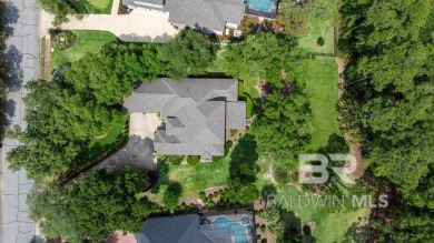 Discover coastal luxury in this former model home, meticulously on Peninsula Golf and Racquet Club in Alabama - for sale on GolfHomes.com, golf home, golf lot
