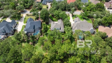 Discover coastal luxury in this former model home, meticulously on Peninsula Golf and Racquet Club in Alabama - for sale on GolfHomes.com, golf home, golf lot