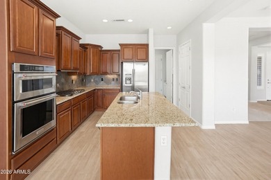 Fabulous Jubilee plan on a premium golf course lot & tucked on a on Copper Canyon Golf Club in Arizona - for sale on GolfHomes.com, golf home, golf lot