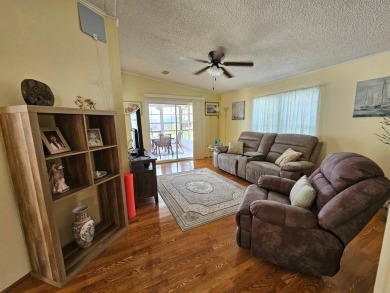 This home is on leased land which means buyers do not own the on Big Cypress Golf and Country Club in Florida - for sale on GolfHomes.com, golf home, golf lot