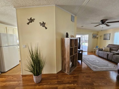 This home is on leased land which means buyers do not own the on Big Cypress Golf and Country Club in Florida - for sale on GolfHomes.com, golf home, golf lot