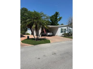 Exquisite 3-Bedroom Palm Harbor Home on the Golf Course! on Schalamar Creek Golf and Country Club in Florida - for sale on GolfHomes.com, golf home, golf lot
