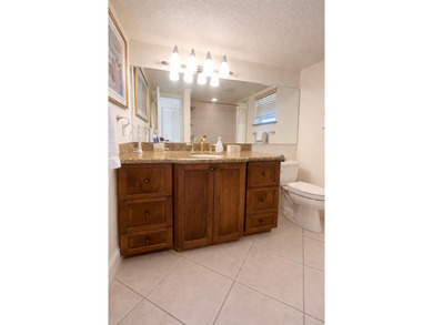 This exceptional two-bedroom, two-bath residence offers refined on The Little Club in Florida - for sale on GolfHomes.com, golf home, golf lot