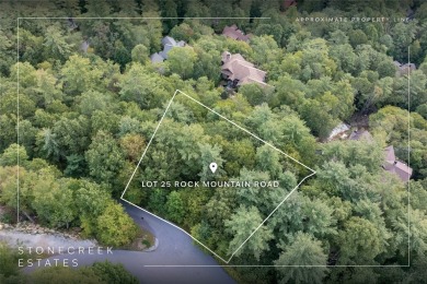 This homesite offers a rare blend of mountain scenery and on The Country Club of Sapphire Valley in North Carolina - for sale on GolfHomes.com, golf home, golf lot