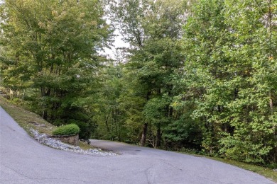 This homesite offers a rare blend of mountain scenery and on The Country Club of Sapphire Valley in North Carolina - for sale on GolfHomes.com, golf home, golf lot