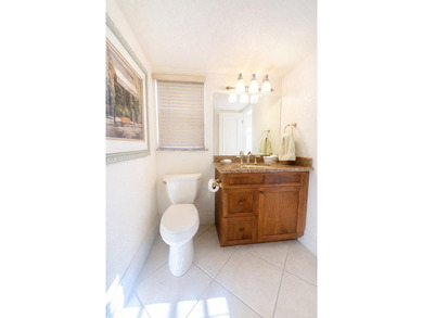 This exceptional two-bedroom, two-bath residence offers refined on The Little Club in Florida - for sale on GolfHomes.com, golf home, golf lot