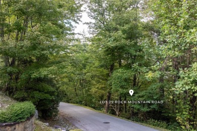 This homesite offers a rare blend of mountain scenery and on The Country Club of Sapphire Valley in North Carolina - for sale on GolfHomes.com, golf home, golf lot