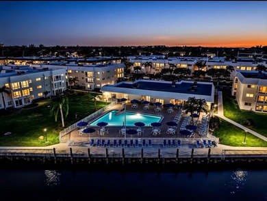 This exceptional two-bedroom, two-bath residence offers refined on The Little Club in Florida - for sale on GolfHomes.com, golf home, golf lot