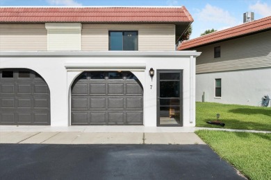 Welcome to Ocean Palm Villas North! This beautiful end unit is on Ocean Palm Golf Course in Florida - for sale on GolfHomes.com, golf home, golf lot