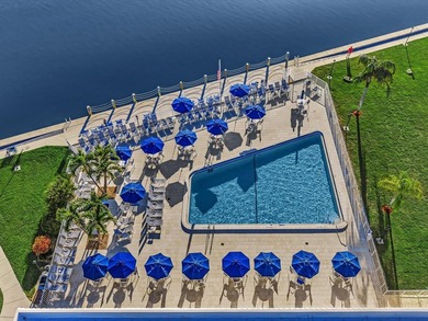 This exceptional two-bedroom, two-bath residence offers refined on The Little Club in Florida - for sale on GolfHomes.com, golf home, golf lot