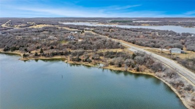LOOKING FOR YOUR DREAM WATERFRONT CONSTRUCTION LOT & NO HOA? on Twisted Oaks Golf Club in Texas - for sale on GolfHomes.com, golf home, golf lot