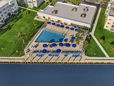 This exceptional two-bedroom, two-bath residence offers refined on The Little Club in Florida - for sale on GolfHomes.com, golf home, golf lot