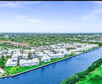 This exceptional two-bedroom, two-bath residence offers refined on The Little Club in Florida - for sale on GolfHomes.com, golf home, golf lot