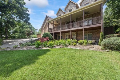 Discover this stunning European estate spanning three levels in on Holiday Island Golf Course in Arkansas - for sale on GolfHomes.com, golf home, golf lot