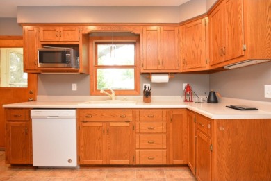 Updated 2 bedroom 2 bath ranch home just steps from a on Odana Hills Golf Course in Wisconsin - for sale on GolfHomes.com, golf home, golf lot