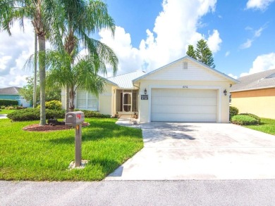 Low monthly land lease $610 in vibrant 55+ community.  Full on Spanish Lakes Fairways in Florida - for sale on GolfHomes.com, golf home, golf lot