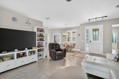 *** THIS HOME HAS EVERYTHING***  Come out to this 55+ community on Arlington Ridge Golf Club in Florida - for sale on GolfHomes.com, golf home, golf lot